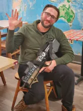 Robert Evans holding gun